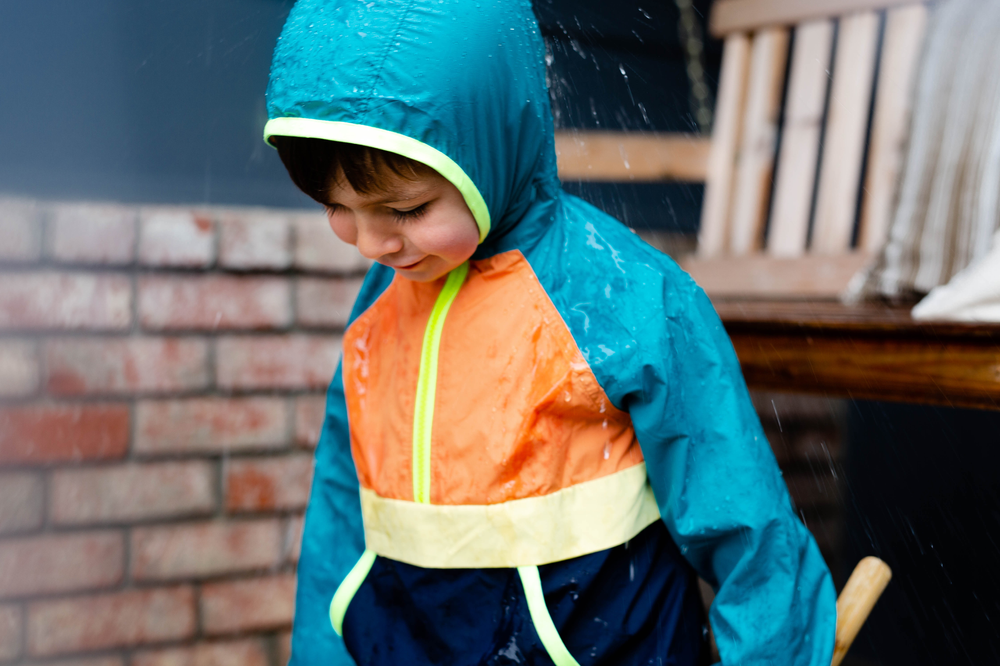 little boy playing in the rain, San Jose, CA